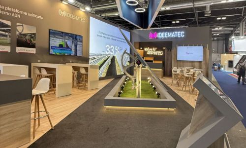 Custom exhibition stand for Ideematec at Genera 2025 – premium booth with solar tracker and overhead truss by PG Exhibition Stands
